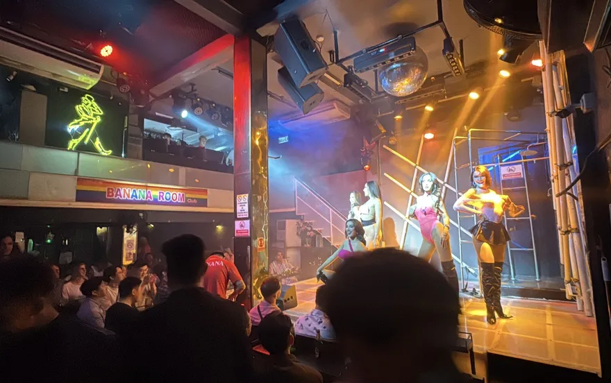 The audience watching a cabaret number from the floor of the showroom